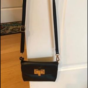 Black and gold leather crossbody bag